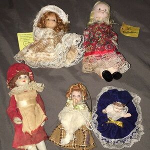 Porcelain collection of miniature dolls